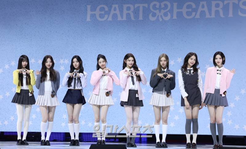 The members of the group Hearts2Hearts, Yeoun, Stella, Yuna, Ian, Ena, Jueun, Carmen, and Jiwoo, pose at the showcase for their first single 'The Chase' held at YES24 Live Hall in Gwangjin-gu, Seoul on the afternoon of February 24th. 