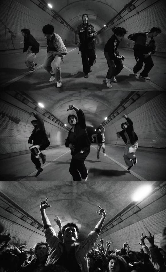 Cortis's synchronized dance in the dark tunnel radiates dynamic energy through a gritty visual style. The shaky camera and bold angles, rotating up, down, or 180 degrees, complement the raw vibe of the song. /BigHit Music