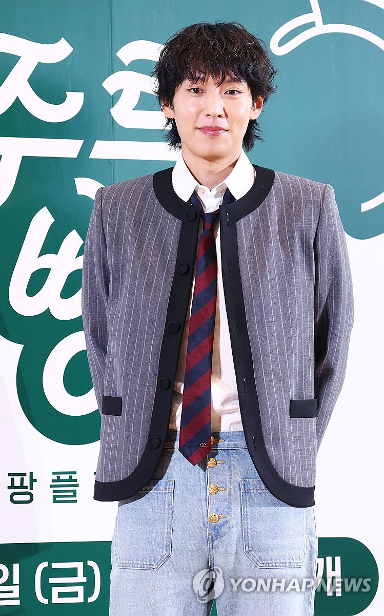Lee Ki-taek, shy smile