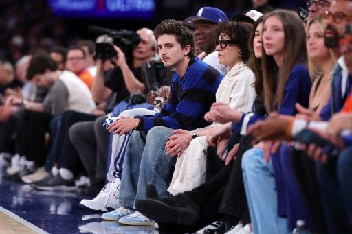 Timothée Chalamet watching an NBA game alone instead of attending the Met Gala