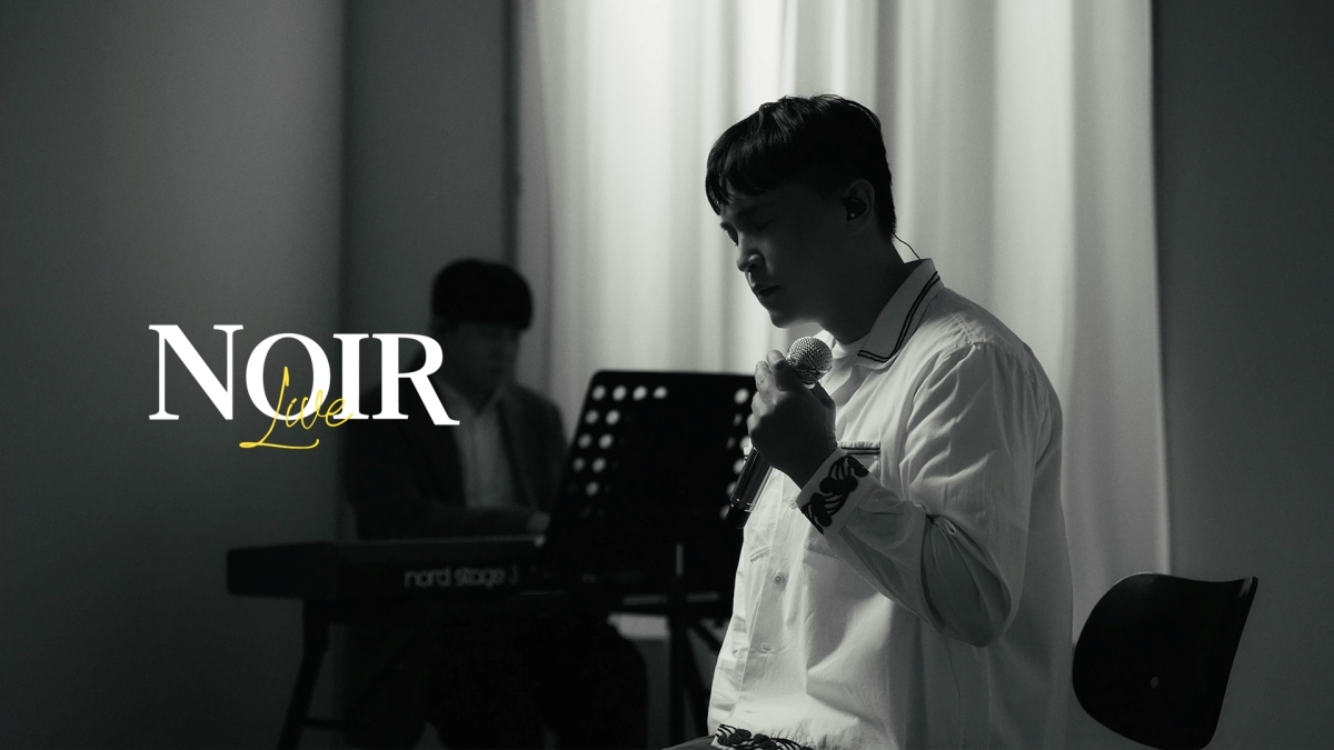 A scene from singer Isu's cover project 'NOIR' singing video for the new song 'Have You Ever Loved?'