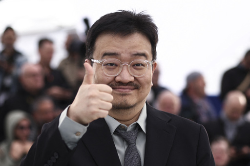 Director Yeon Sang-ho gives a thumbs up at the 'Gunche' photocall event during the 79th Cannes International Film Festival in Cannes, France, on the 15th (local time).