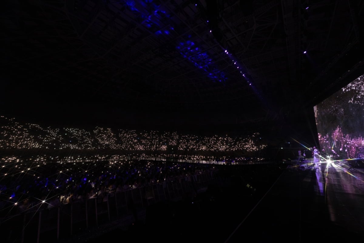 LUCY performing at 'ISLAND'.