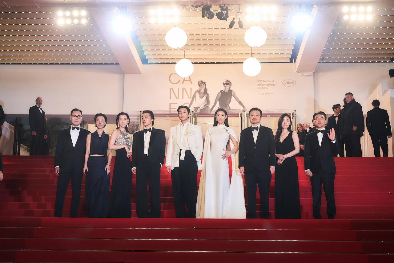 The production team and cast of 'Gunche' on the Cannes Film Festival red carpet [Provided by Showbox]
