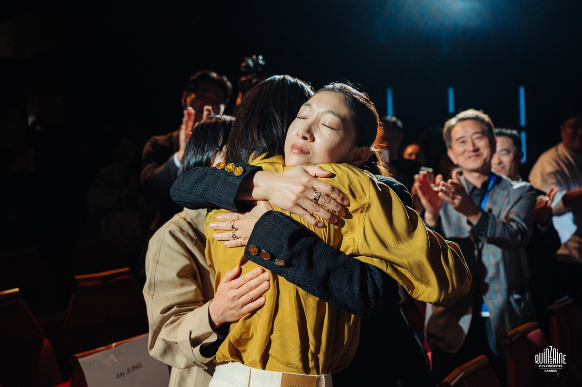 Pain and Healing are Part of Life: Director Jung Ju-ri's 'Dora' Takes on Cannes! 2 Ando Sakura and actress Kim Do-yeon hugging after the screening of 'Dora' at the Cannes Film Festival