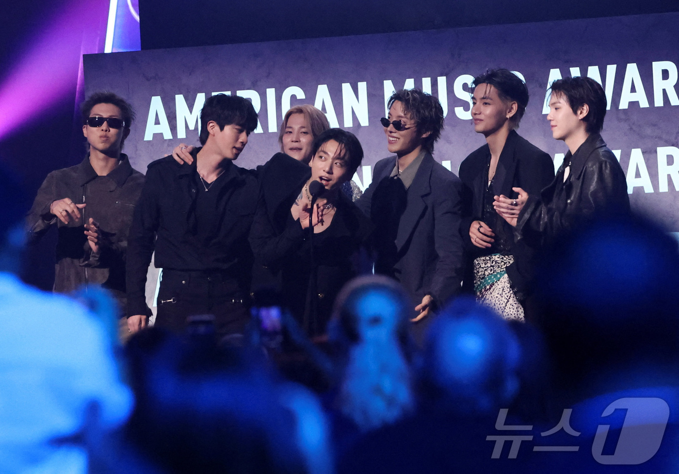 Group BTS giving their acceptance speech after winning the grand prize 'Artist of the Year' at the 'American Music Awards 2026' (AMA 2026) held at the MGM Grand Garden Arena in Las Vegas on the 26th (KST).