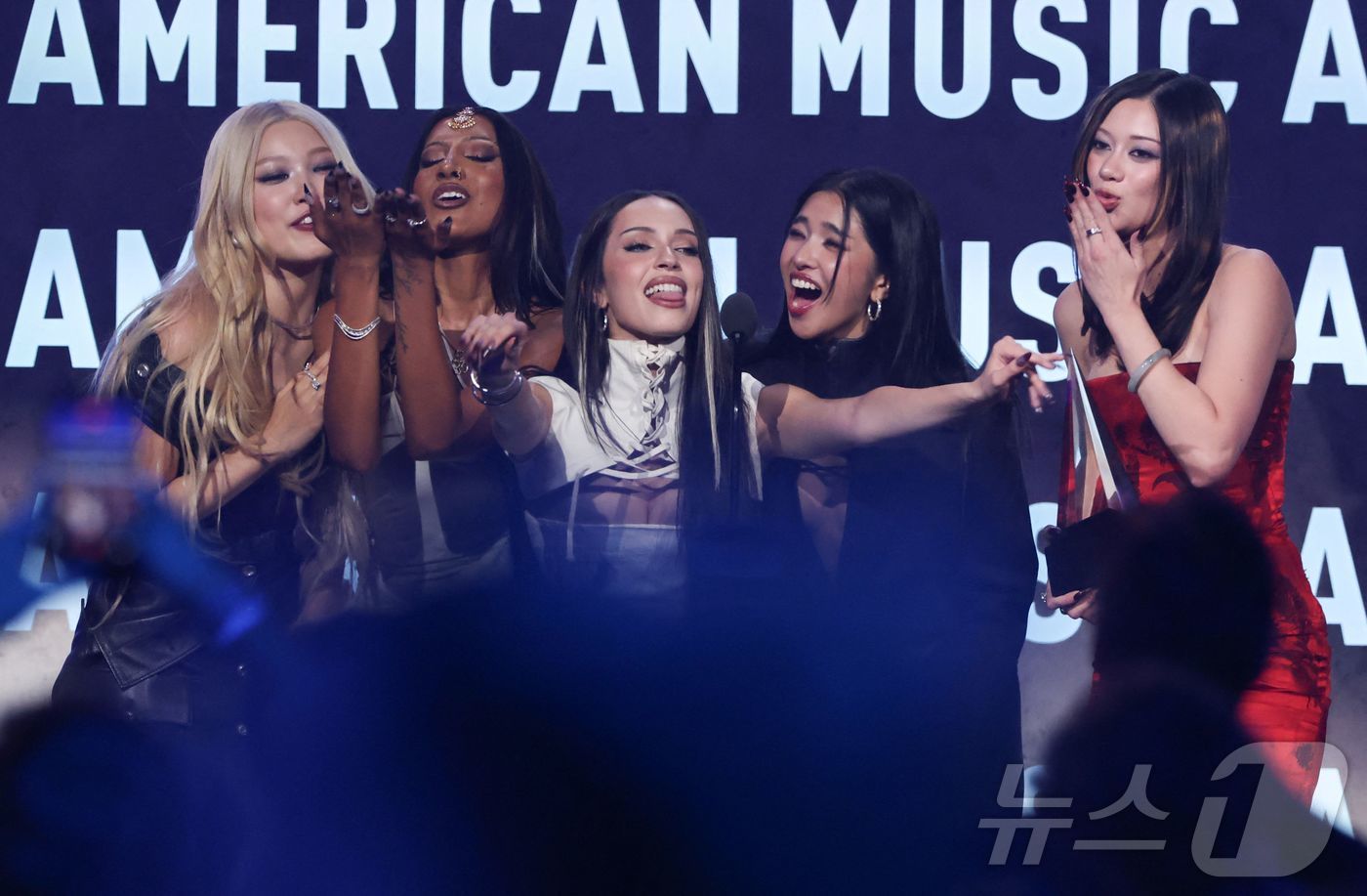 Group KATSEYE giving their acceptance speech after winning the New Artist award at the American Music Awards held at the MGM Grand Garden Arena in Las Vegas, Nevada on May 25, 2026.