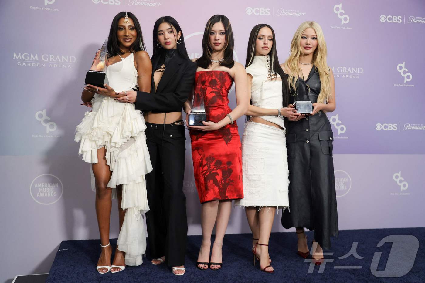 Group KATSEYE posing in the press room after winning the New Artist award at the American Music Awards held at the MGM Grand Garden Arena in Las Vegas, Nevada on May 25, 2026.