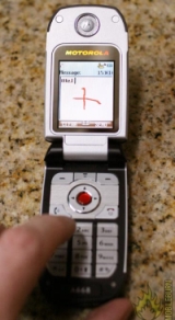 Motorola A668, a touchpad cellphone