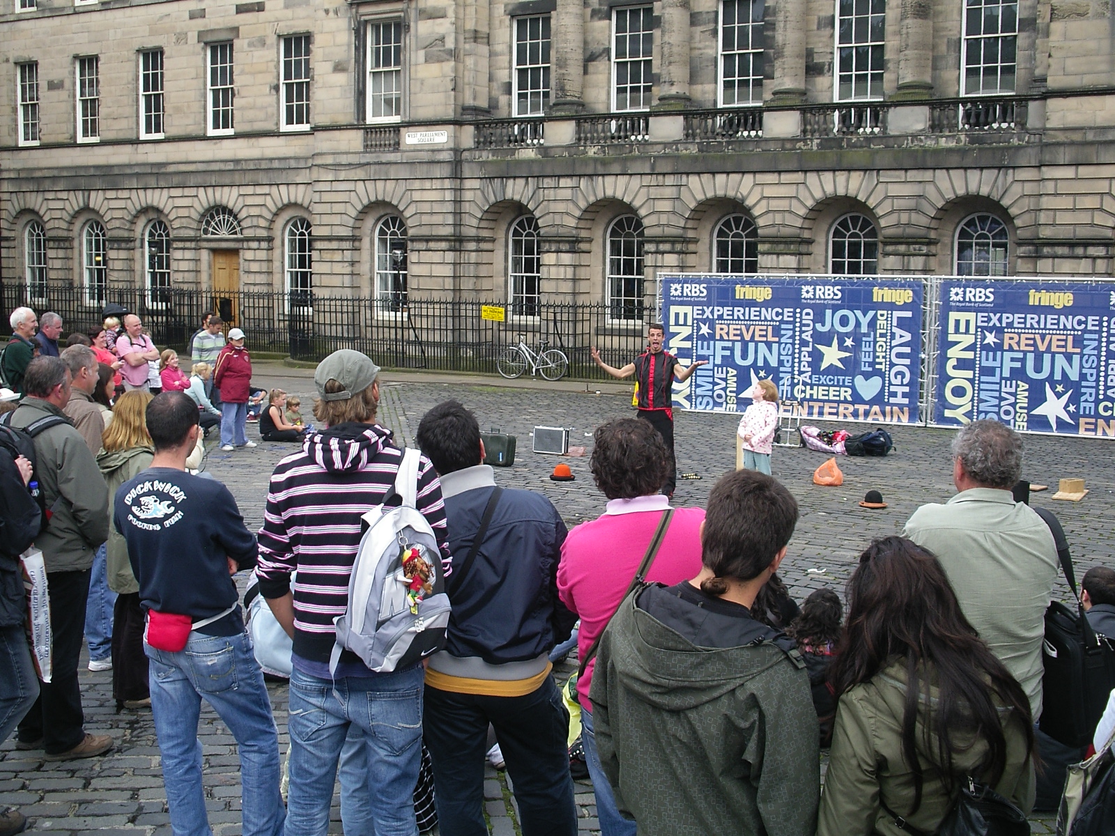 Street performance at a city square, Edinburgh, in Fringe Festival